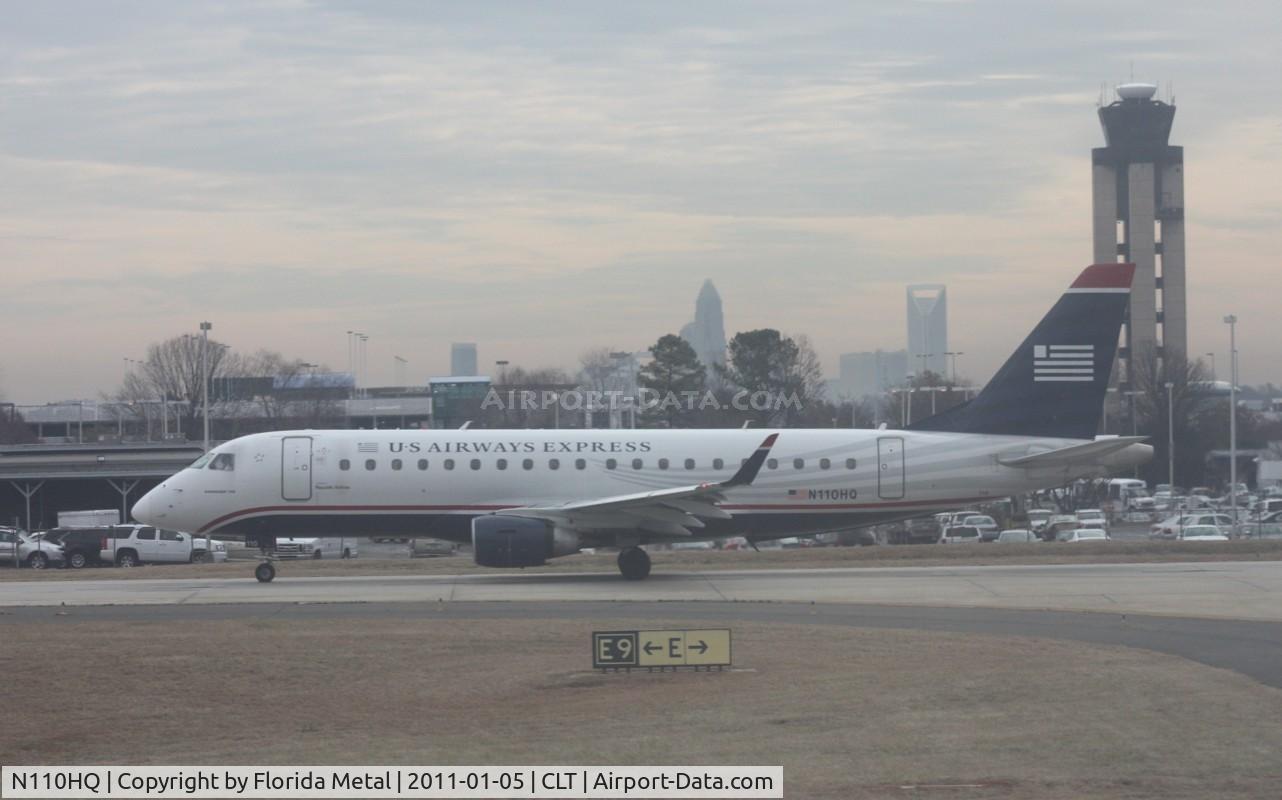 N110HQ, 2007 Embraer 175LR (ERJ-170-200LR) C/N 17000172, US Airways E175 in line to take off as my plane is accelerating down the runway - the window in the plane wasn't the best for taking pics being it is double paned and kind of scratched.