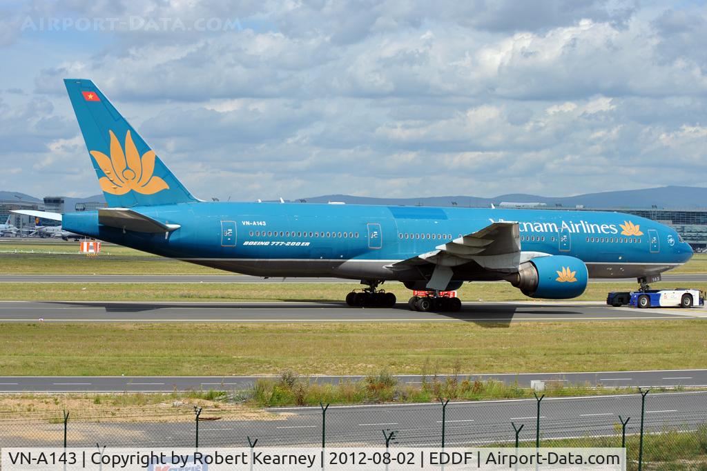 VN-A143, Boeing 777-26K/ER C/N 33502, Being towed around to parking