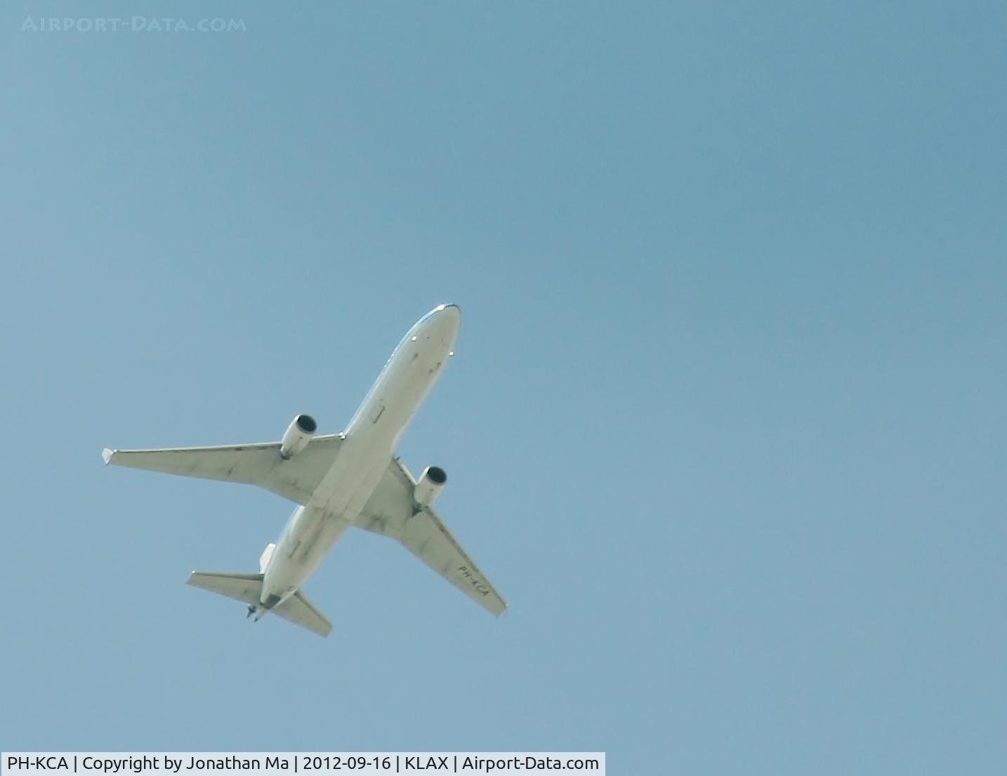 PH-KCA, 1993 McDonnell Douglas MD-11 C/N 48555, Taken from a moving car on the freeway. Landing for LAX