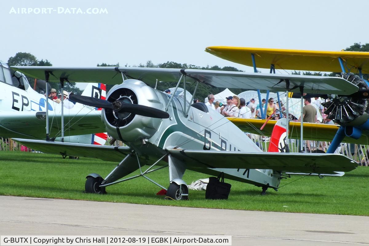 G-BUTX, 1940 Bucker Bu-133C Jungmeister C/N ES.1-4, at the 2012 Sywell Airshow