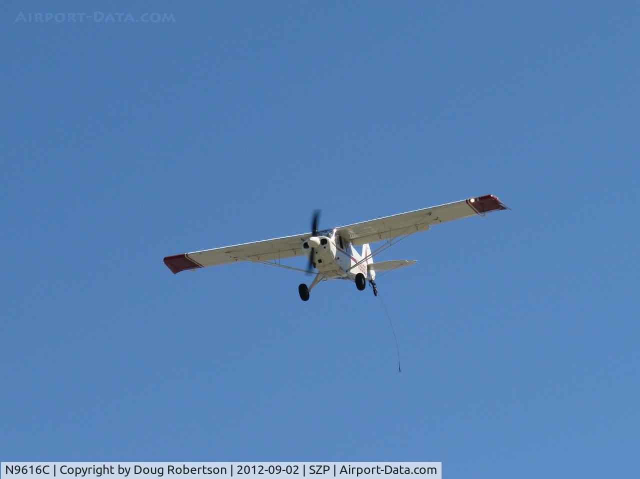 N9616C, 1991 Christen A-1 Husky C/N 1177, 1991 Christen A-1 HUSKY, Lycoming O&VO-360 180 Hp, spades, MT prop, fast approach over Rwy 22L grass for advertising banner tow line pickup with grapnel hook.