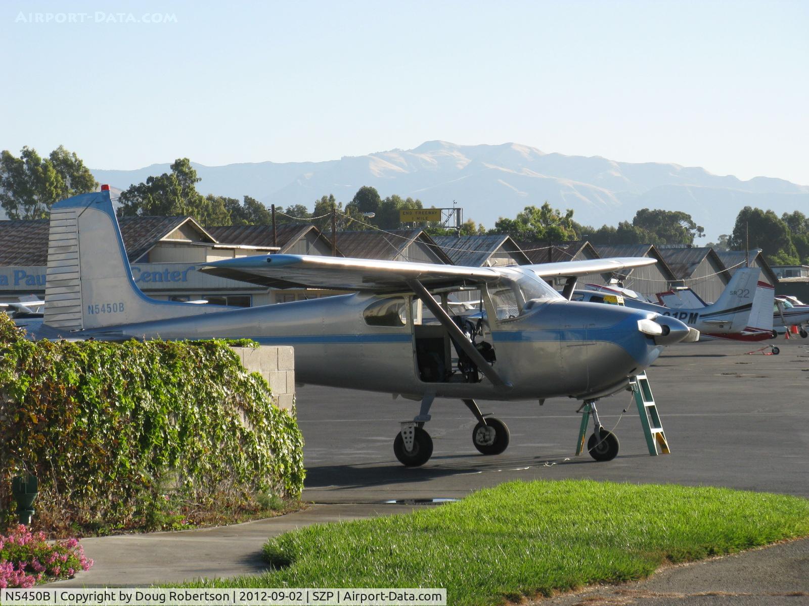 N5450B, 1956 Cessna 182 Skylane C/N 33450, 1956 Cessna 182 SKYLANE, Continental O-470-S 230 Hp, refueling in early morning light