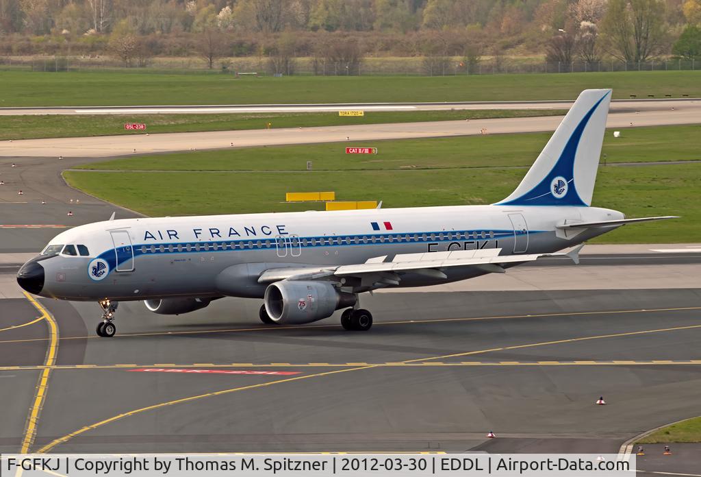 F-GFKJ, 1989 Airbus A320-211 C/N 0063, Air France F-GFKJ taxiing twds. it's stand after roll out Rwy 23L at DUS. Nice retro c/s!