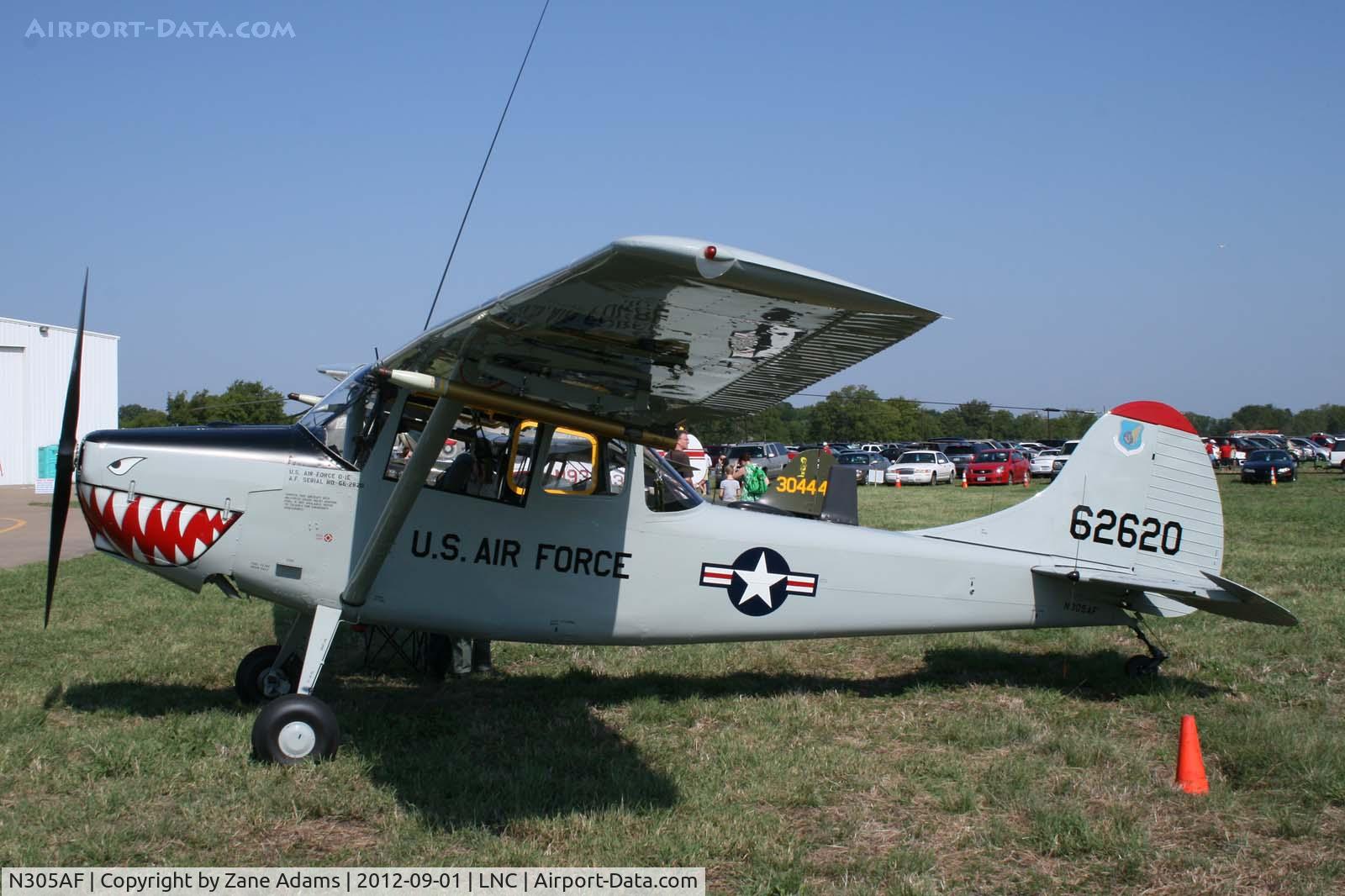 N305AF, 1999 Cessna 305C C/N 305AF, On the ramp during Warbirds on Parade 2012 at Lancaster Airport