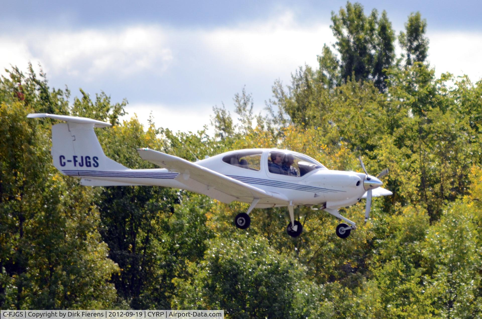 C-FJGS, 2006 Diamond DA-40 Diamond Star C/N 40.709, Approaching the runway during a fly around.