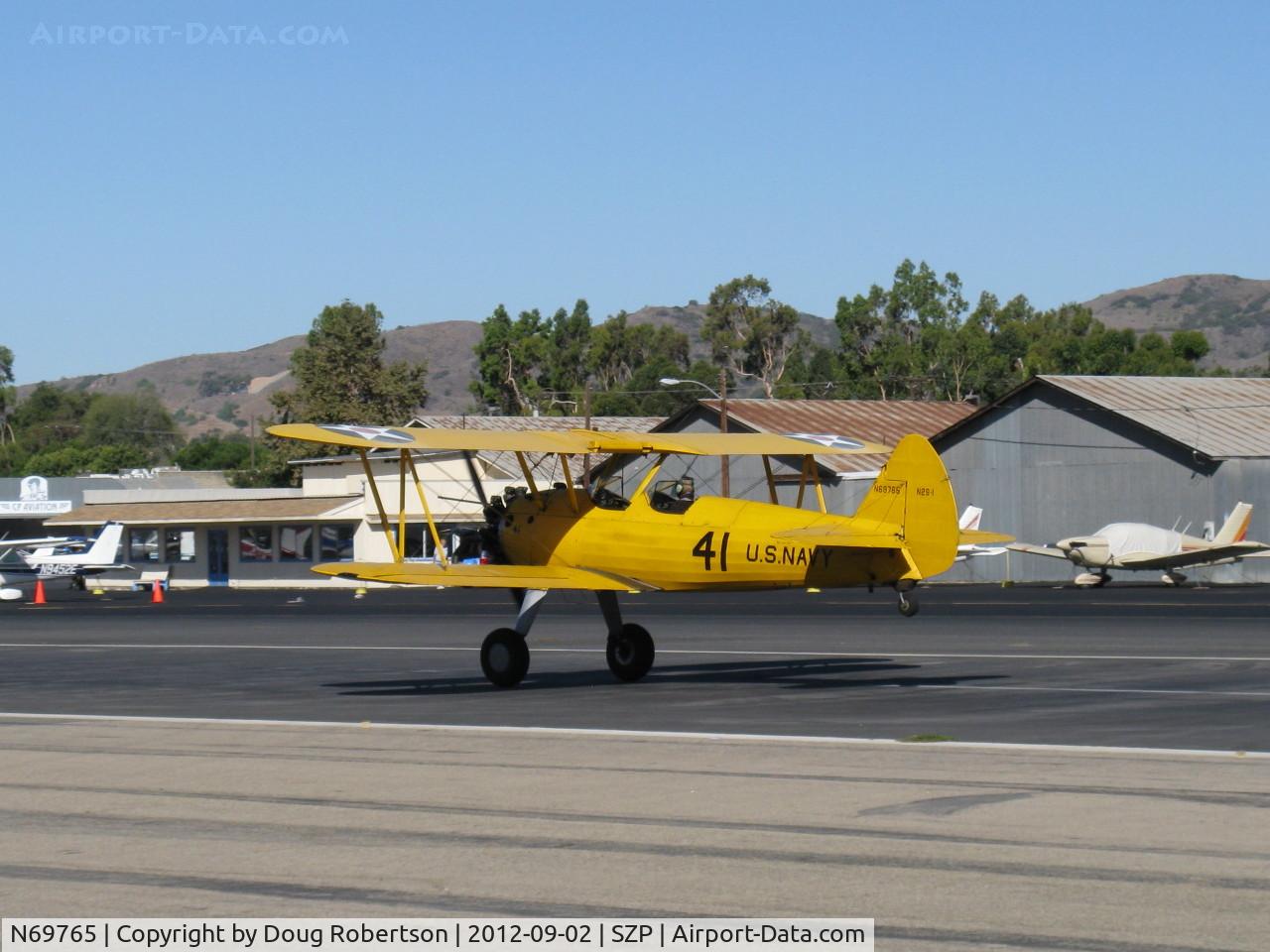 N69765, 1941 Boeing A75N1 (PT17) C/N 75-1044, 1941 Boeing Stearman A75N1 as Navy N2S1, Continental W670 220 Hp radial, landing Rwy 22