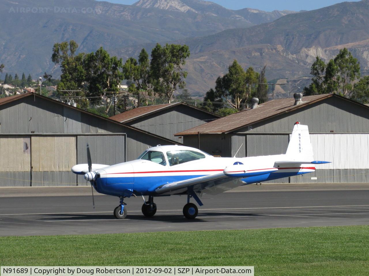 N91689, 1946 North American Navion (NA-145) C/N NAV-4-431, 1946 North American NAVION, Continental E225 upgrade, many mods, newly refinished, landing roll Rwy 22. Arriving from WHP to give Young Eagles rides.