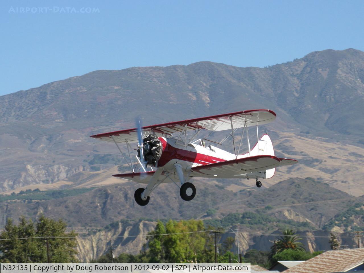 N32135, 1941 Waco UPF-7 C/N 5767, 1941 Waco UPF-7, Continental W670 220 Hp radial, chromed engine, prop & spinner, a stunning showplane and one of the prettiest classic biplanes. Based at SZP. takeoff climb Rwy 22