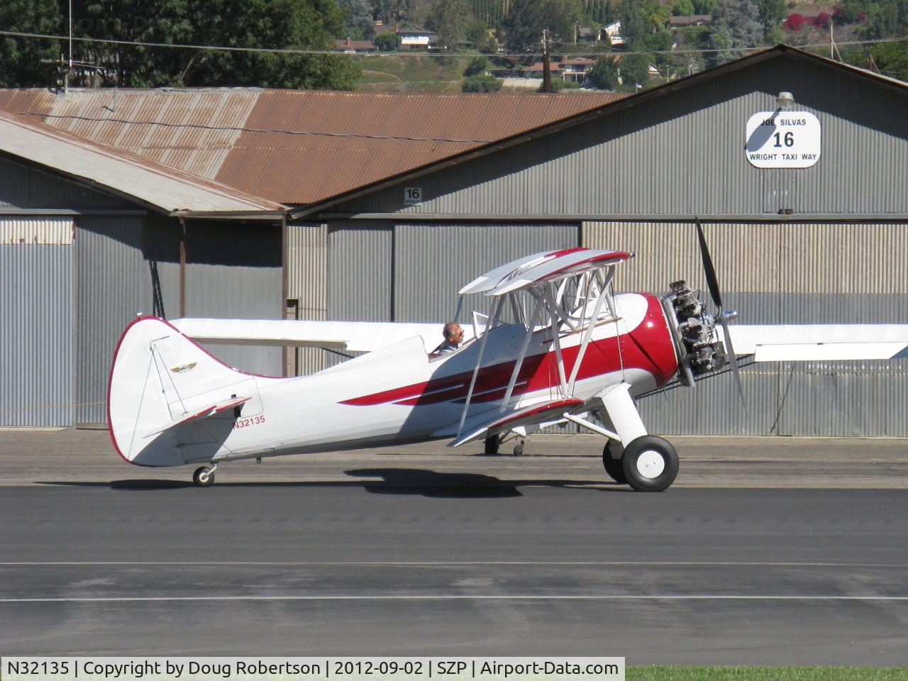 N32135, 1941 Waco UPF-7 C/N 5767, 1941 Waco UPF-7, Continental W670 220 Hp radial, chromed engine, prop & spinner, a stunning showplane, S-turns taxi from hangar to Rwy 22