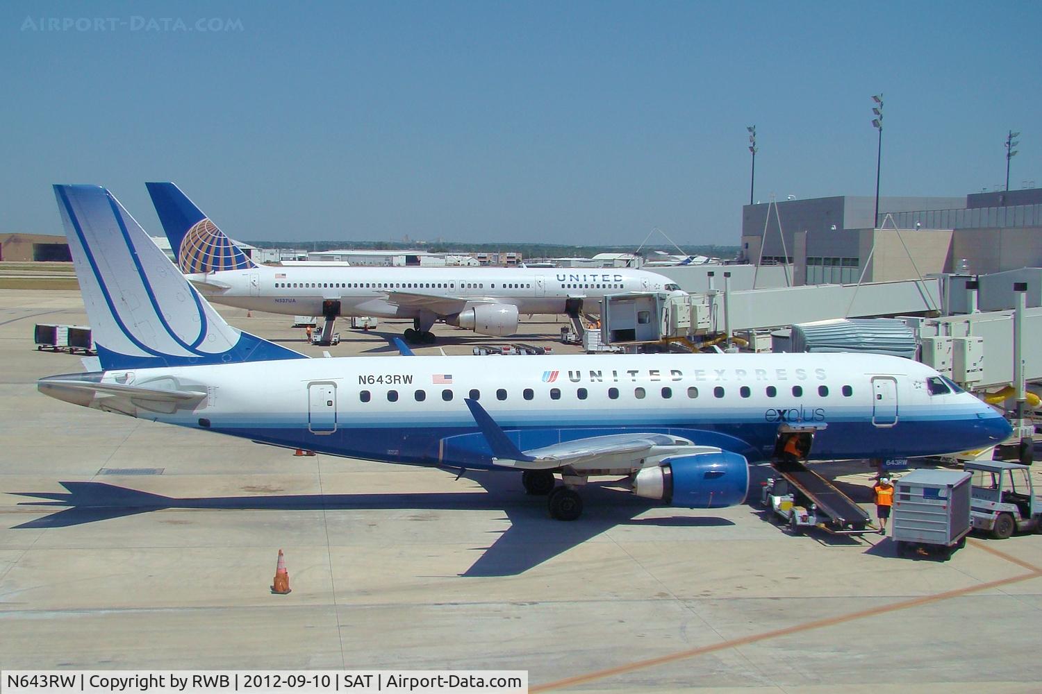 N643RW, 2005 Embraer 170SE (ERJ-170-100SE) C/N 17000060, N643RW & N537UA parked at gates.