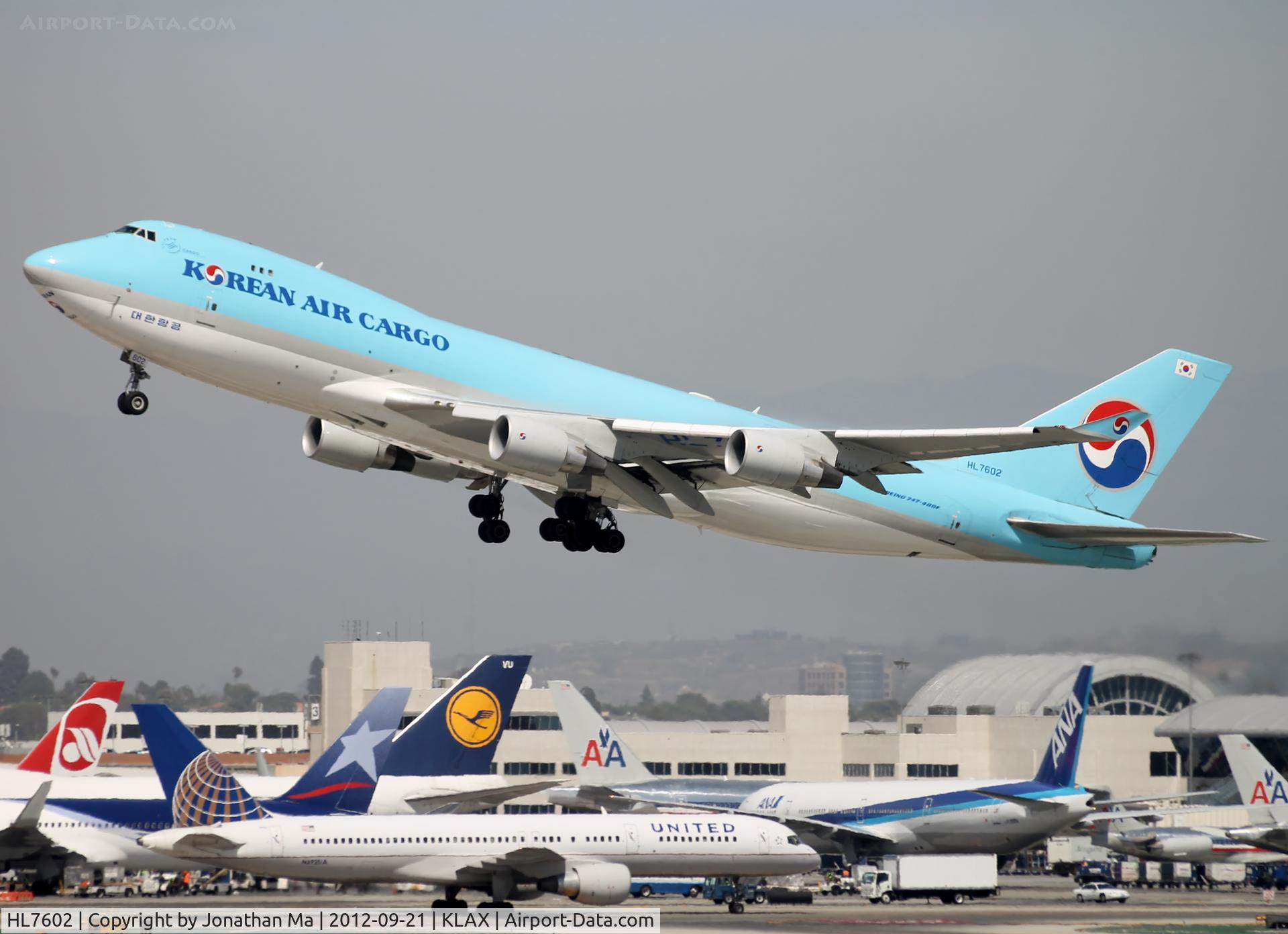 HL7602, 2005 Boeing 747-4B5F/SCD C/N 34301, Takeoff after SCA747 arrives