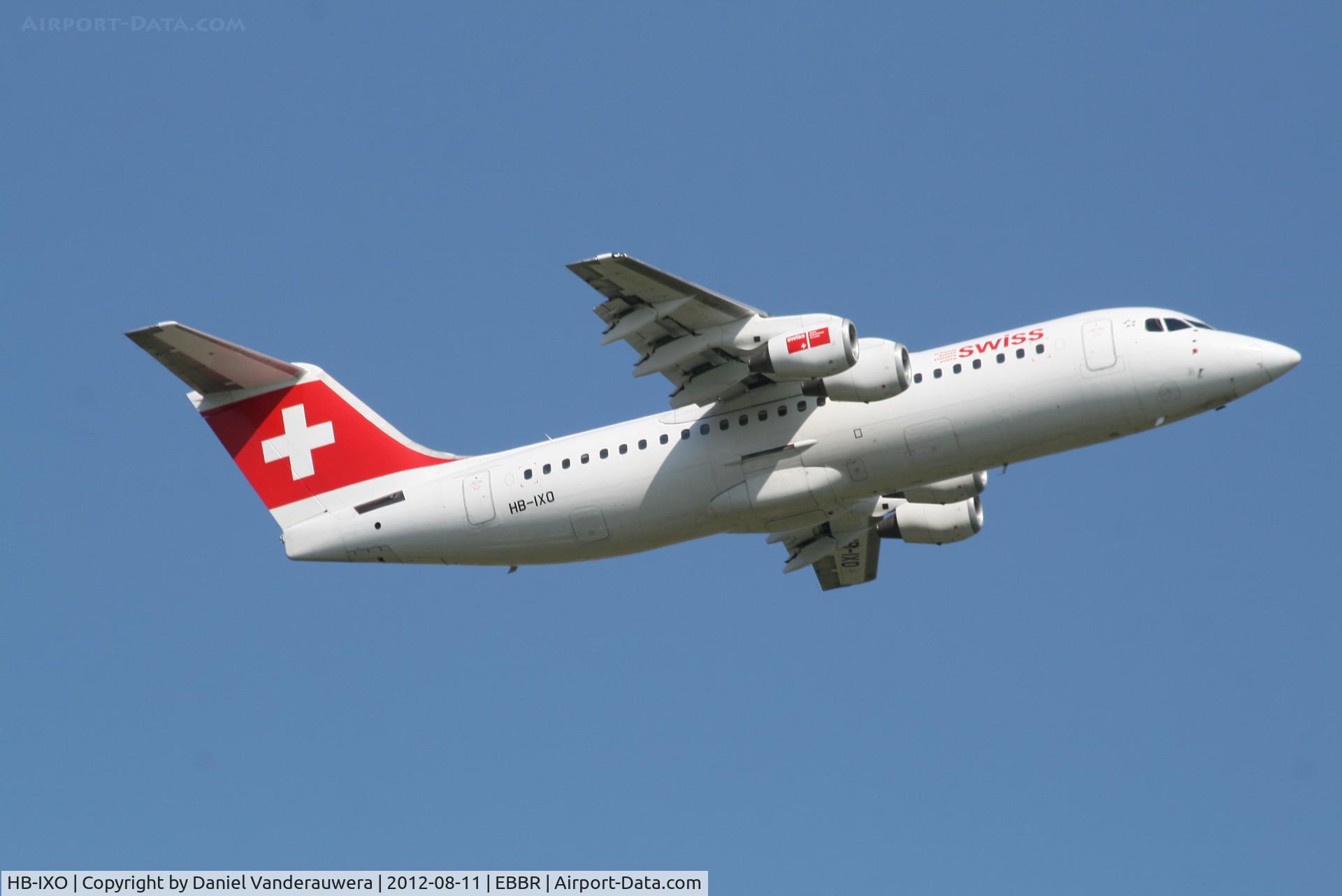HB-IXO, 1996 British Aerospace Avro 146-RJ100 C/N E3284, Flight LX779 is climbing from RWY 07R