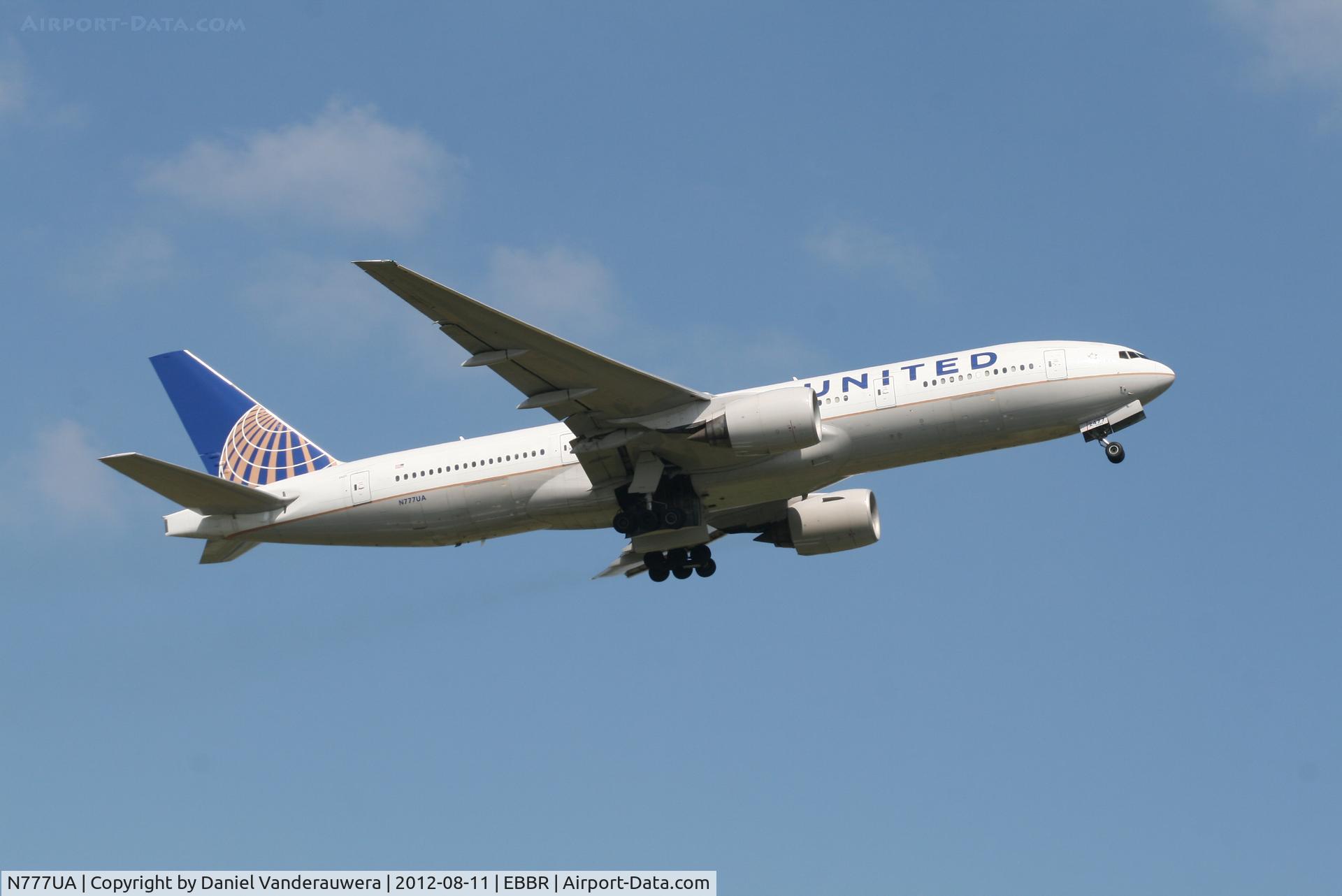 N777UA, 1995 Boeing 777-222 C/N 26916, Flight UA951 is climbing from RWY 07R