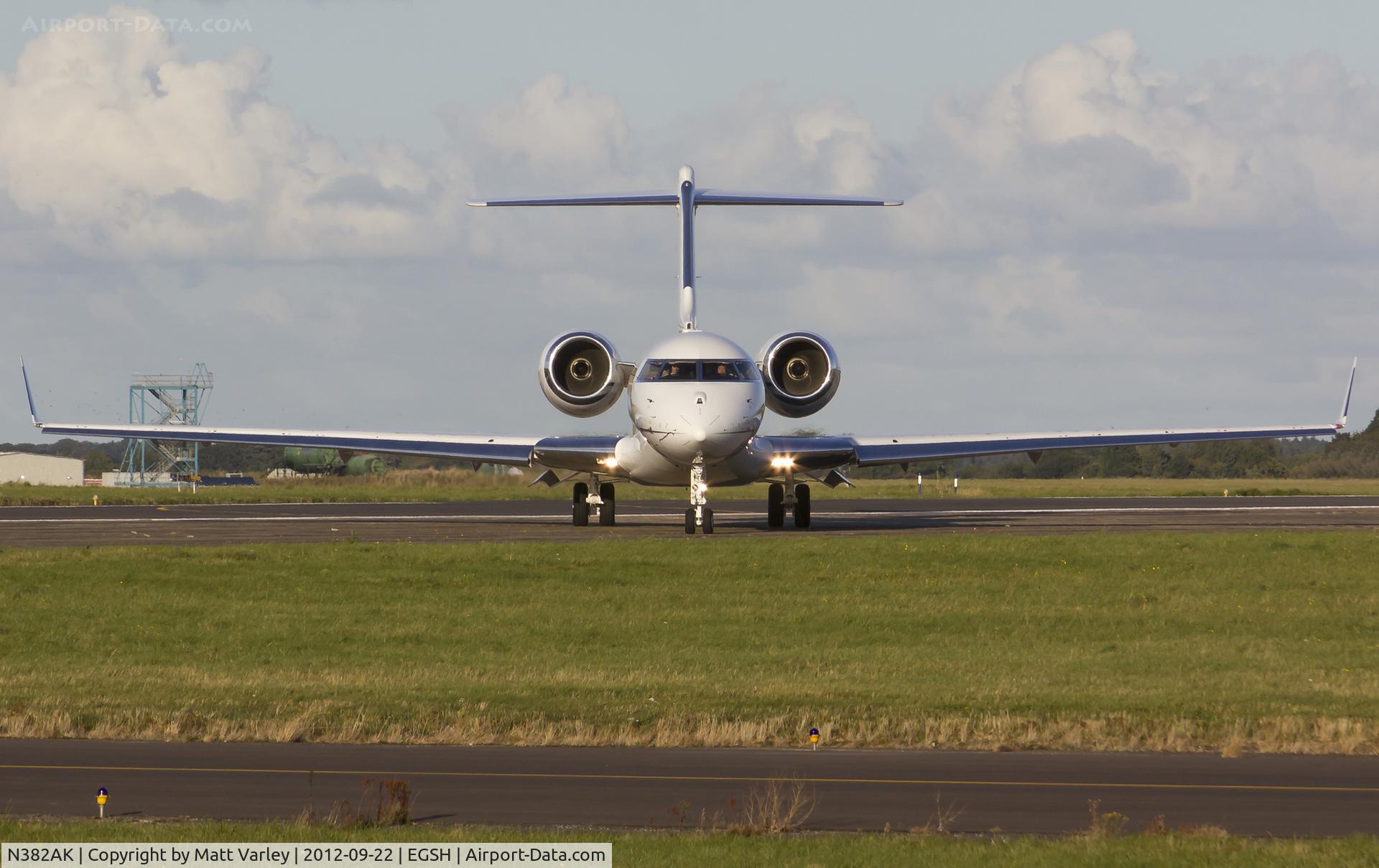 N382AK, 2005 Bombardier BD-700-1A10 Global Express XRS C/N 9181, Departing EGSH in the evening sun.