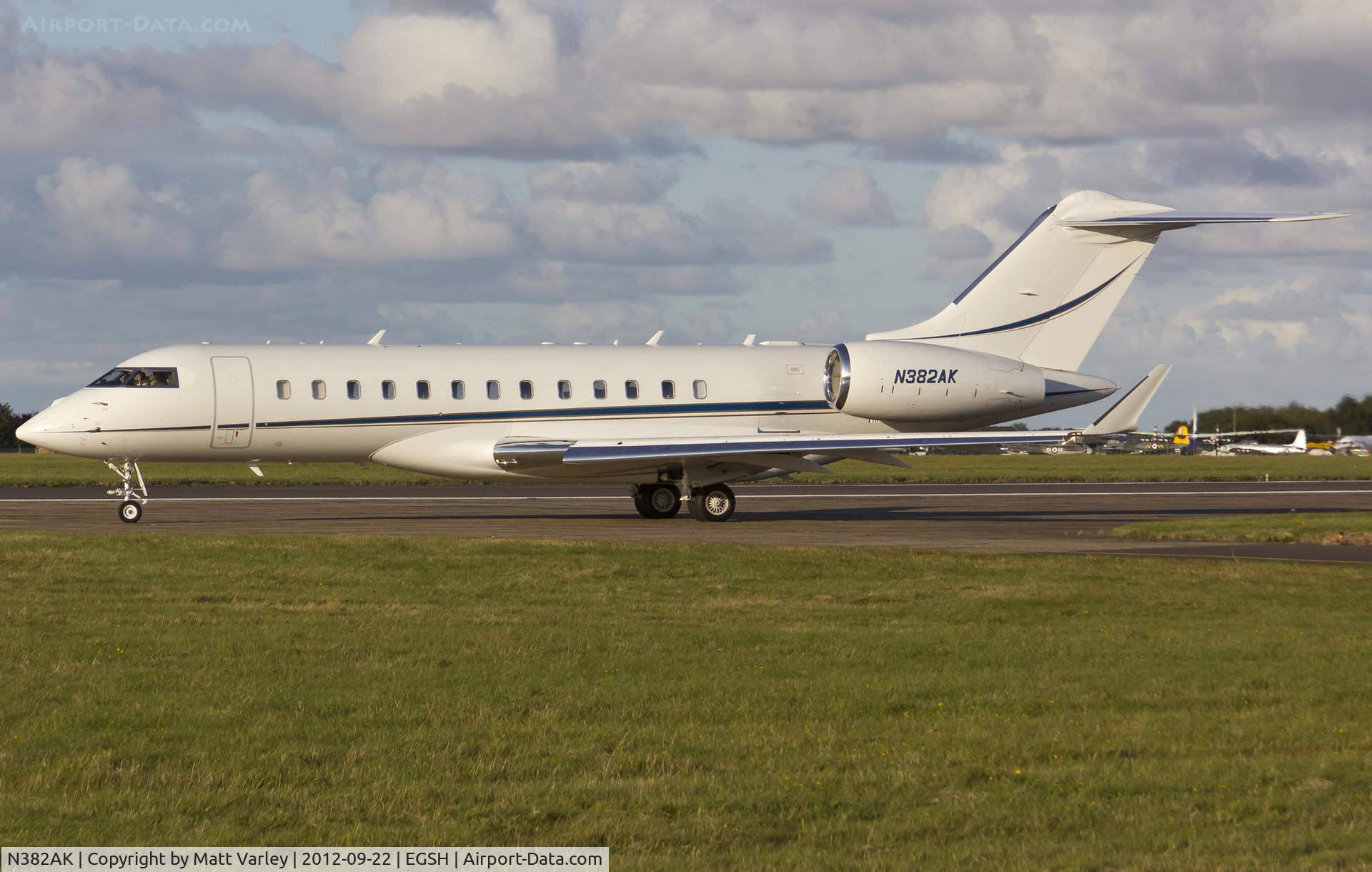 N382AK, 2005 Bombardier BD-700-1A10 Global Express XRS C/N 9181, Departing EGSH in the evening sun.