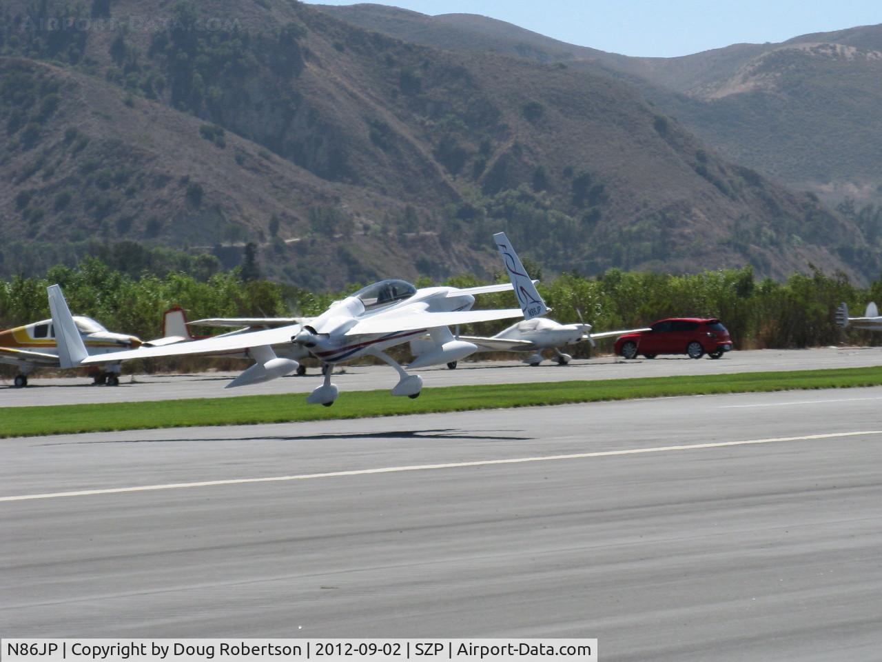 N86JP, 1986 Rutan Long-EZ C/N 839, 1986 Potter LONG EZE canard, Lycoming O-235 115 Hp pusher, long range tanks, takeoff Rwy 22