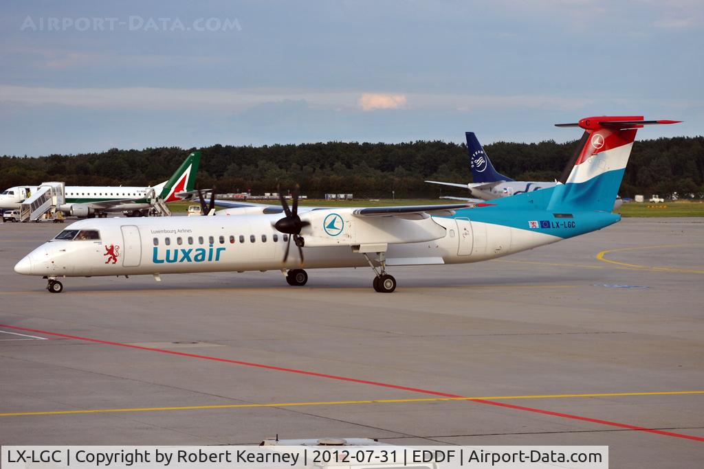 LX-LGC, 2007 De Havilland Canada DHC-8-402Q Dash 8 C/N 4162, Pulling in to parking along side us