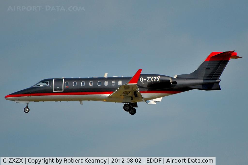 G-ZXZX, 2001 Learjet 45 C/N 45-005, On short finals for r/w 25L