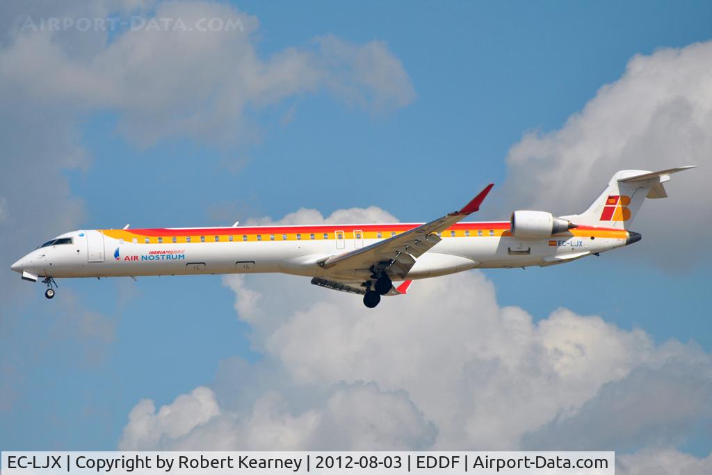 EC-LJX, 2010 Bombardier CRJ-1000ER NG (CL-600-2E25) C/N 19008, On short finals for r/w 25L