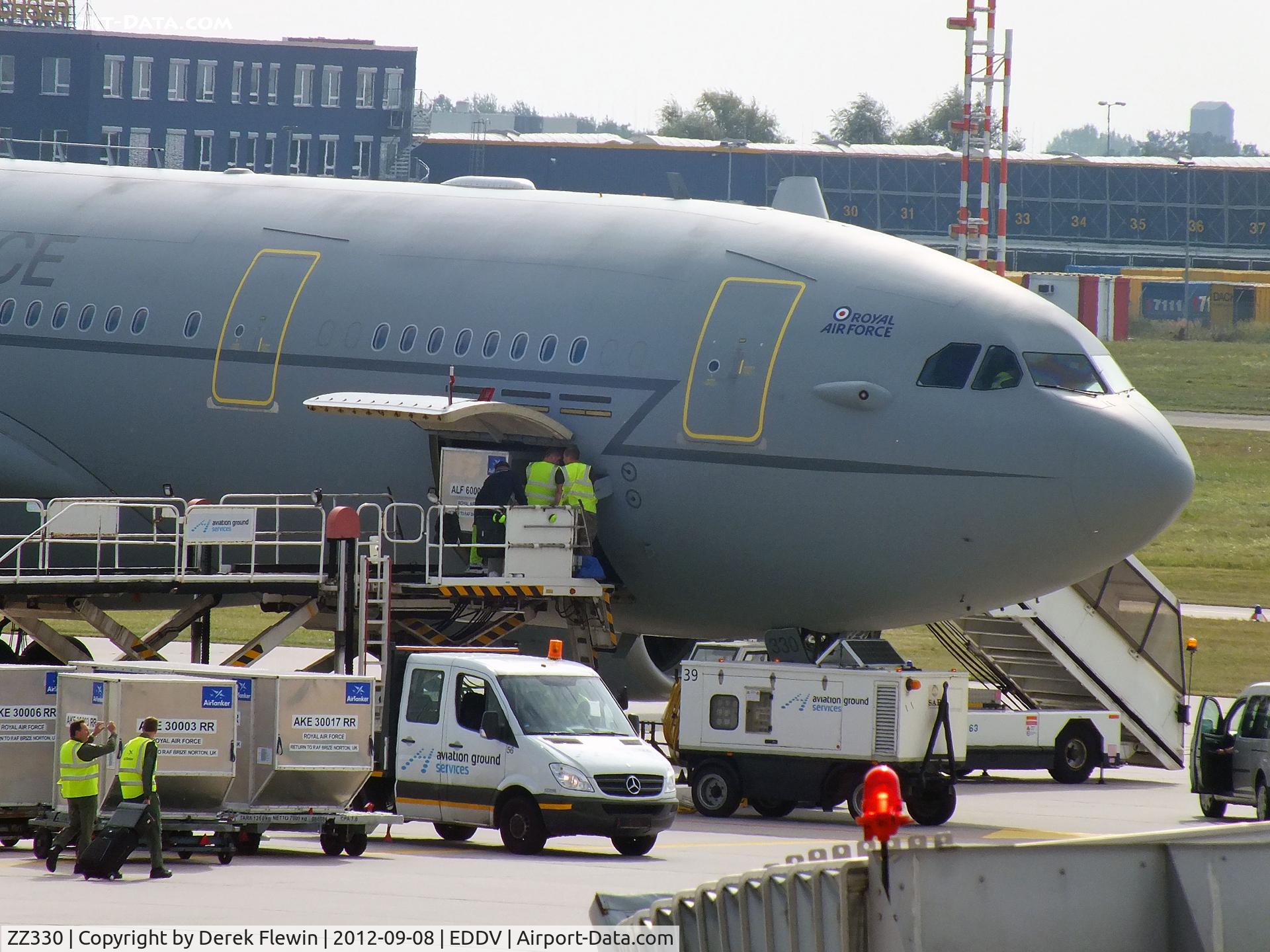 ZZ330, 2009 Airbus KC2 Voyager (A330-243MRTT) C/N 1046, Both Military and Civilian Movers loading Aircraft prior to departing for EGVN.