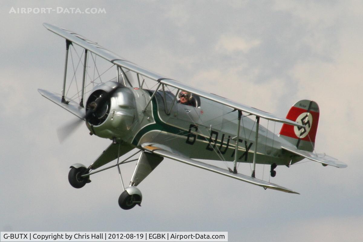 G-BUTX, 1940 Bucker Bu-133C Jungmeister C/N ES.1-4, at the 2012 Sywell Airshow