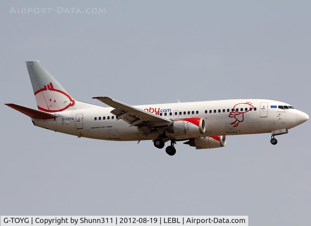 G-TOYG, 1998 Boeing 737-36N C/N 28872, Landing rwy 25R