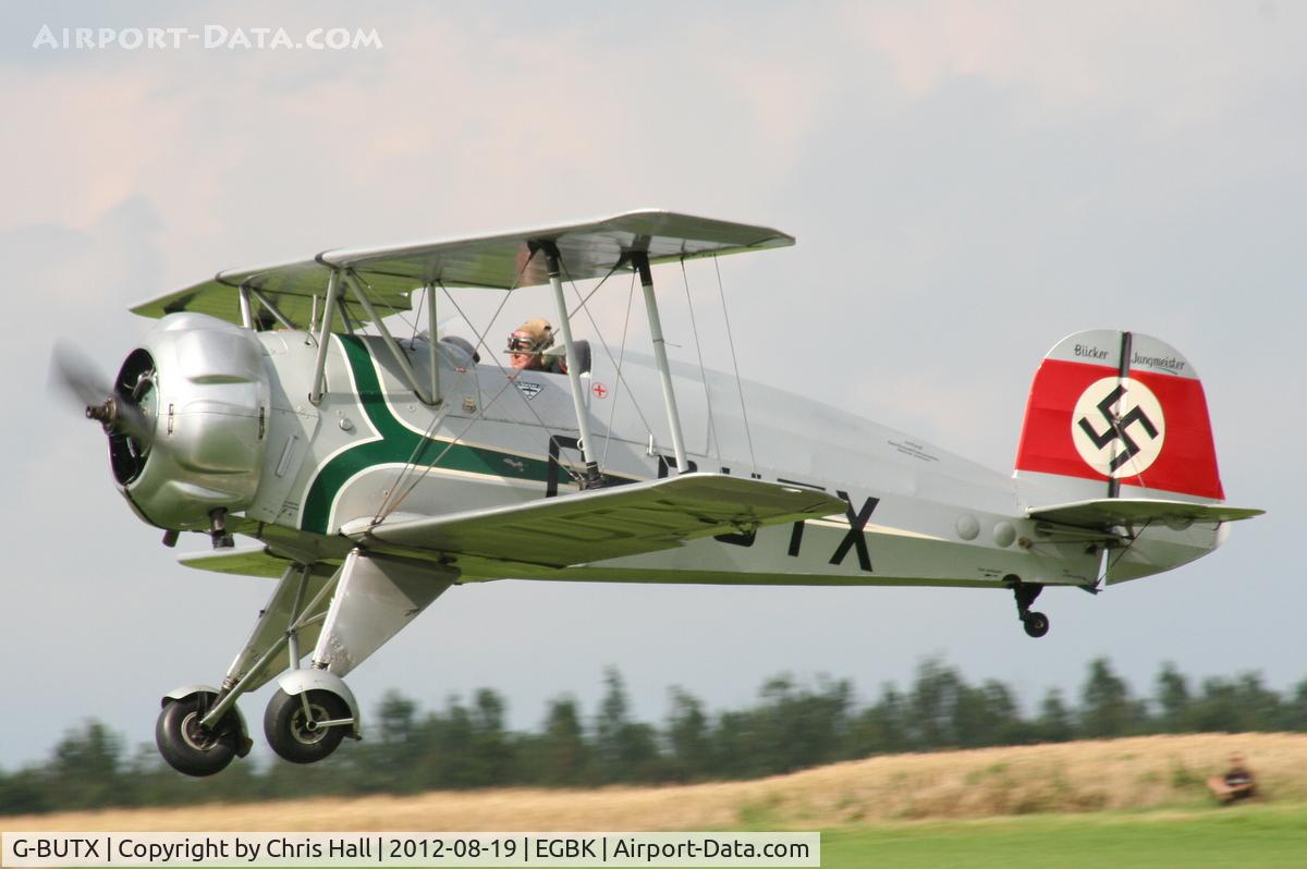 G-BUTX, 1940 Bucker Bu-133C Jungmeister C/N ES.1-4, at the 2012 Sywell Airshow