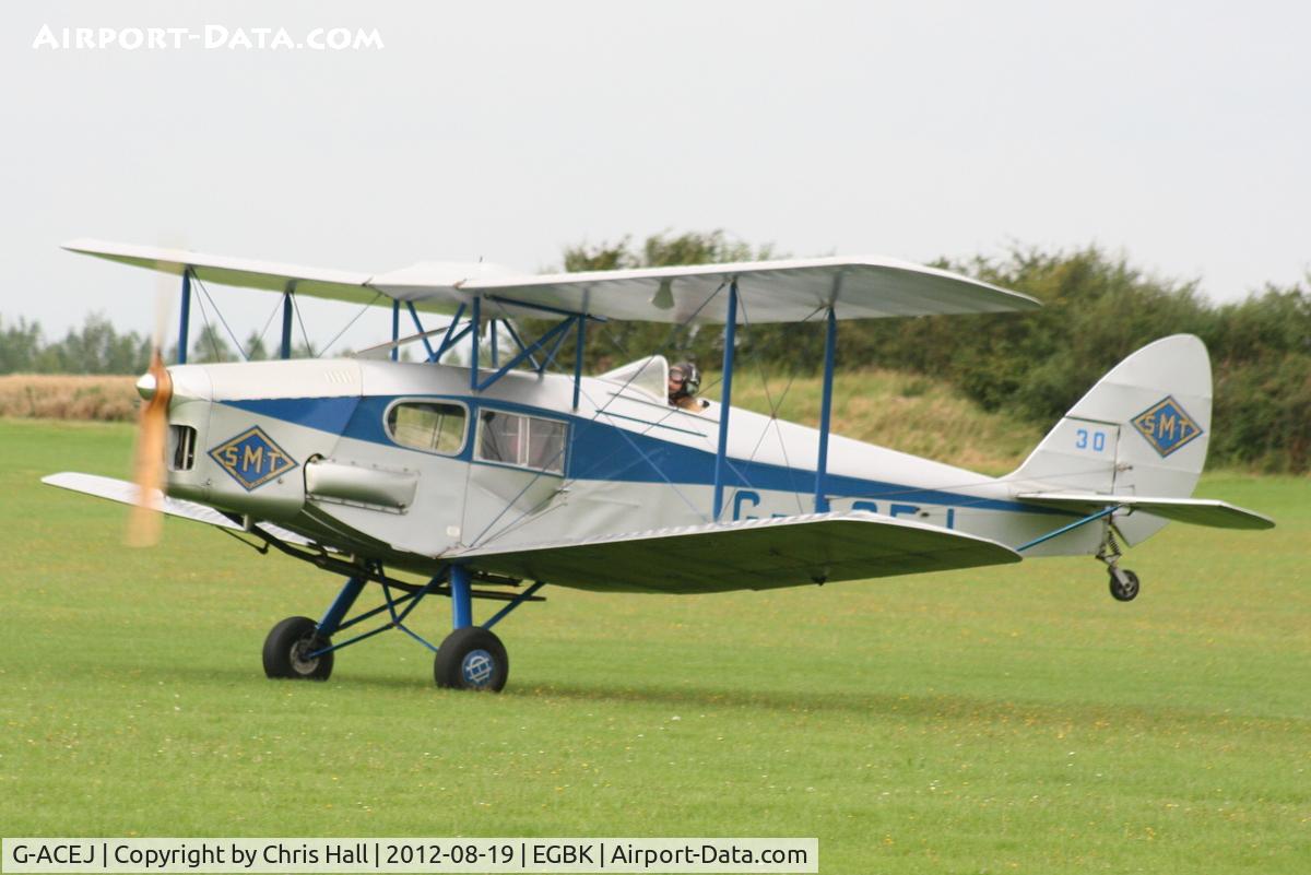 G-ACEJ, 1933 De Havilland DH.83 Fox Moth C/N 4069, at the 2012 Sywell Airshow
