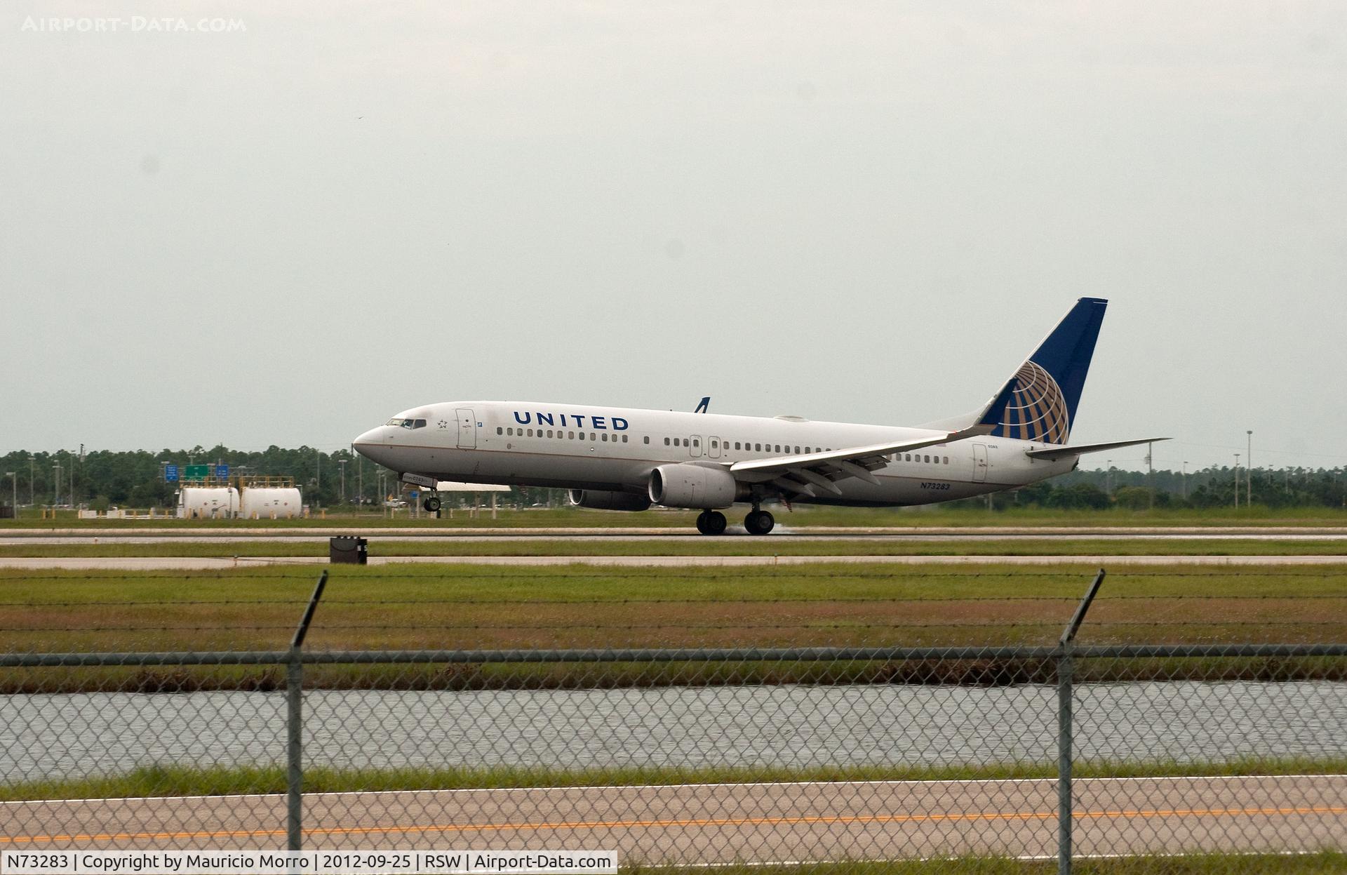 N73283, 2004 Boeing 737-824 C/N 31606, United 737 touching down at RSW