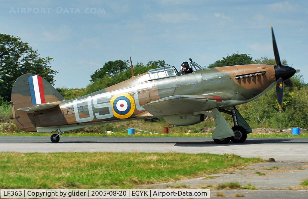 LF363, 1944 Hawker Hurricane IIC C/N 41H/469290, Friendly wave from the pilot