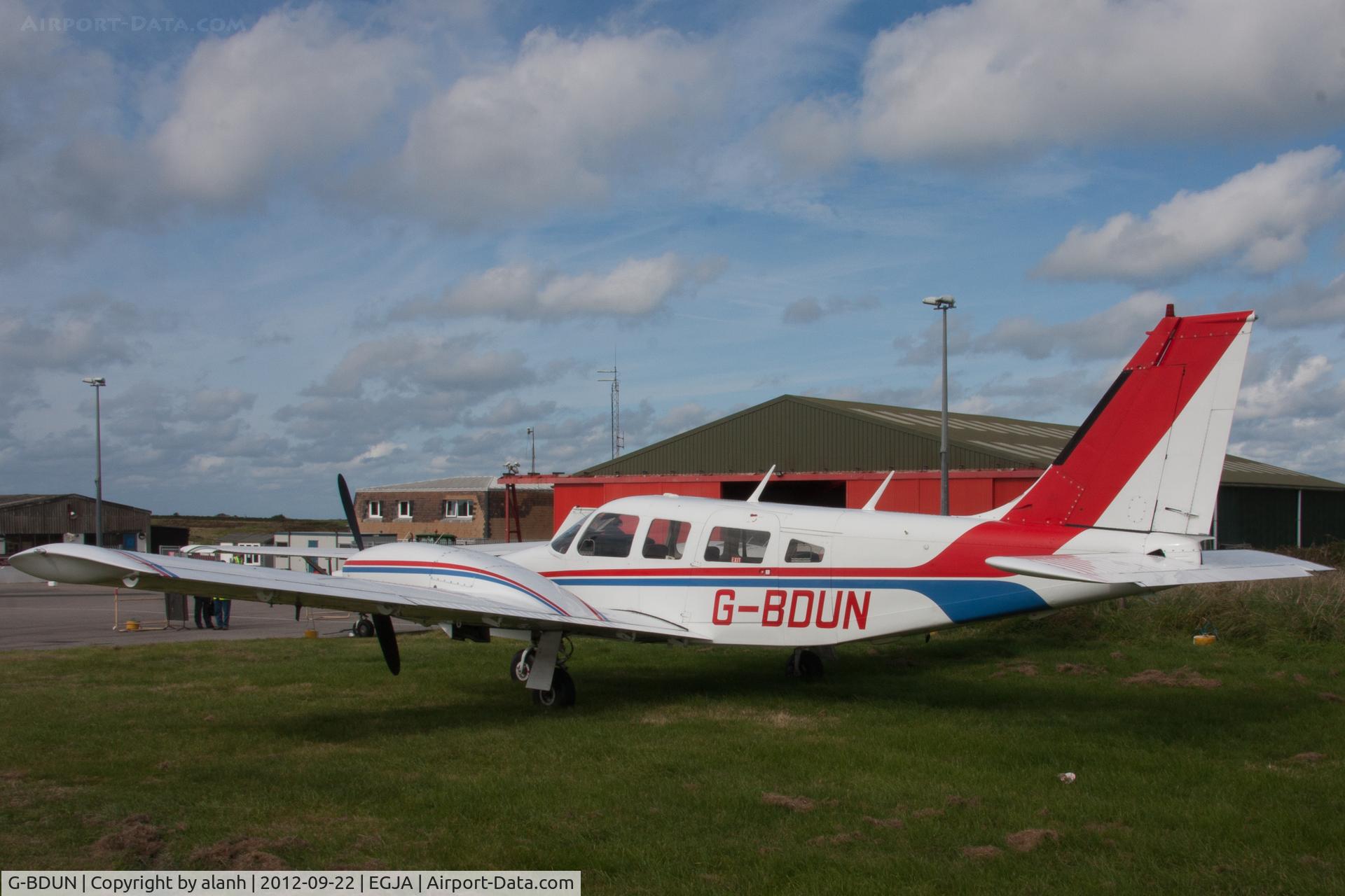 G-BDUN, 1975 Piper PA-34-200T Seneca II C/N 34-7570163, Alderney resident; parked at the side of the field on Air Race day 2012
