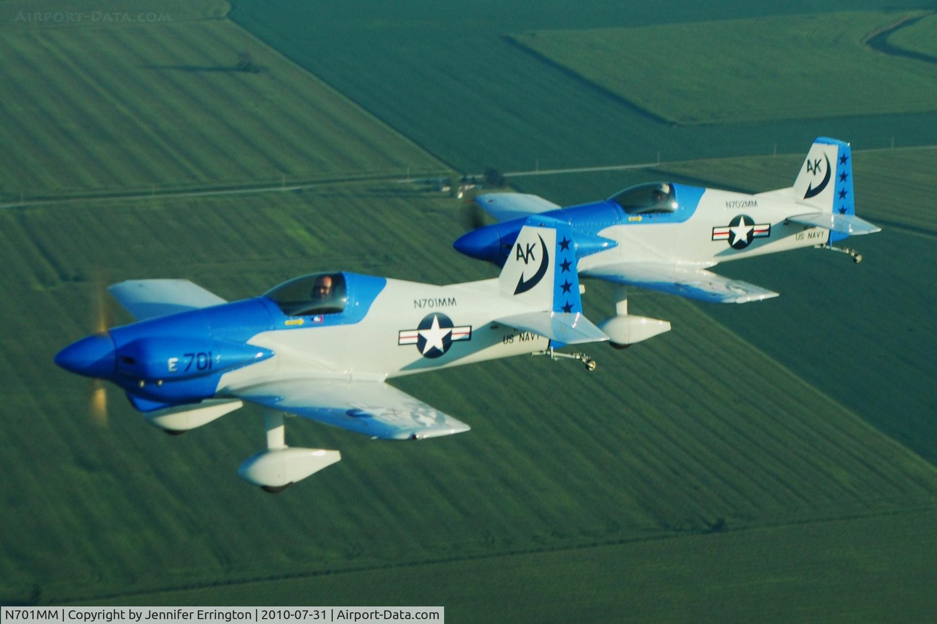 N701MM, Bushby Midget Mustang M-1 C/N M-I-2184, Twin Midget Mustangs flying near Kenton, OH. Builders/pilots are Brad & John Errington (son/father). Picture taken by Jennifer Errington in the family C-182.