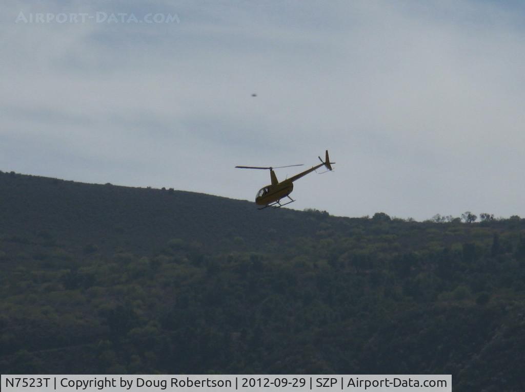 N7523T, 2004 Robinson R44 Raven II C/N 10311, 2004 Robinson R44 RAVEN II, Lycoming O-540 derated to 245 Hp for 5 minutes, 205 Hp continuous, refinished, departure along river route