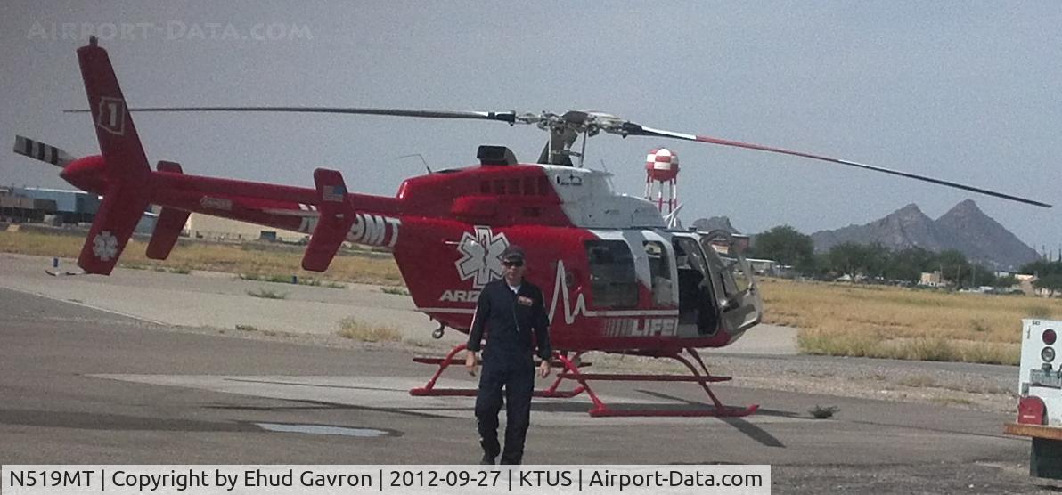 N519MT, 2009 Bell 407 C/N 53956, James Campbell during his preflight inspection of N519MT at MedTrans hangar KTUS, Tucson AZ