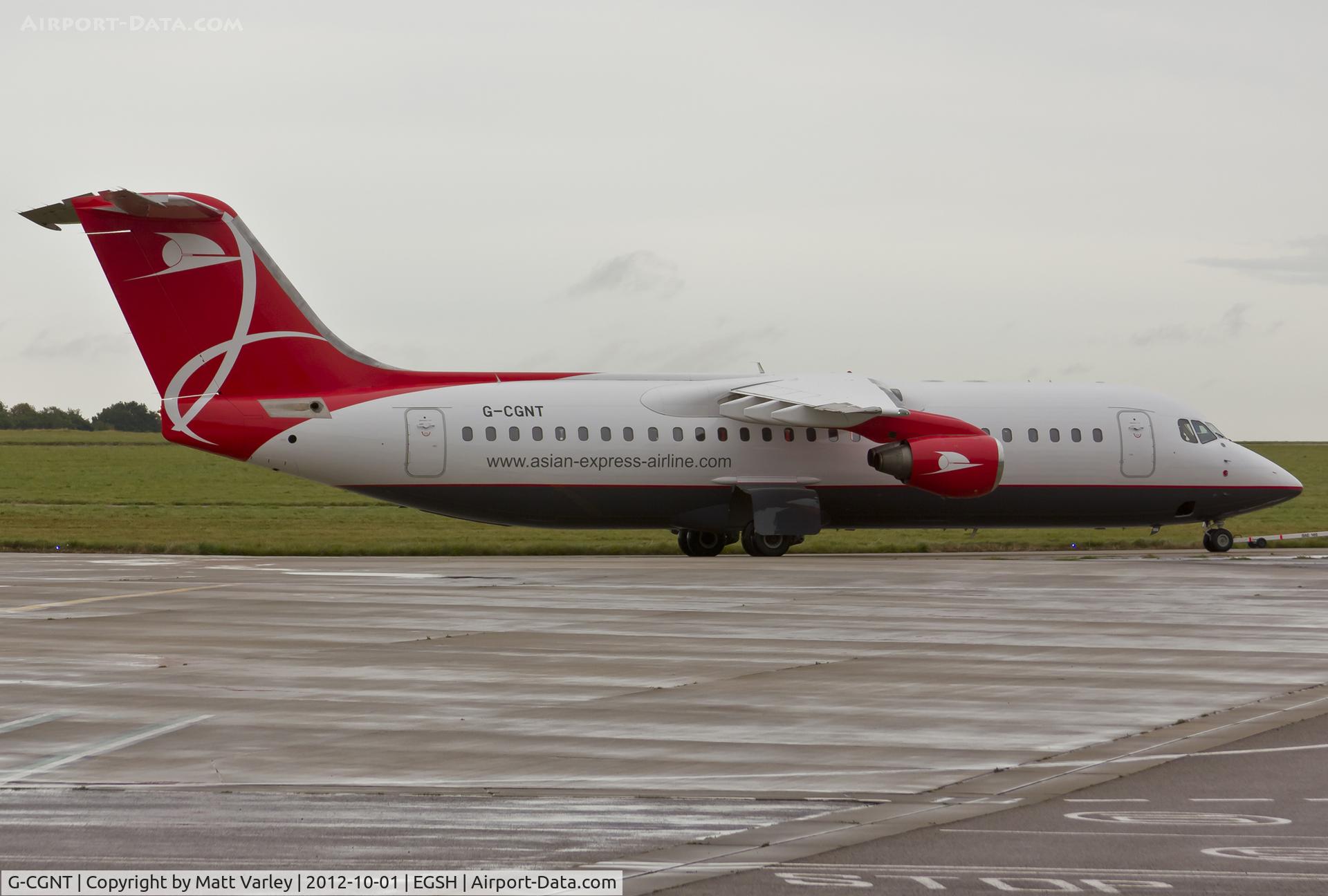 G-CGNT, 2000 Avro RJ100 C/N E.3374, Being towed back to the Air Livery hangar after some high powered engine runs.