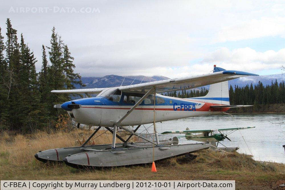 C-FBEA, 1964 Cessna 180H Skywagon C/N 180-51465, On the shore of the Yukon River downstream from Whitehorse, Yukon.