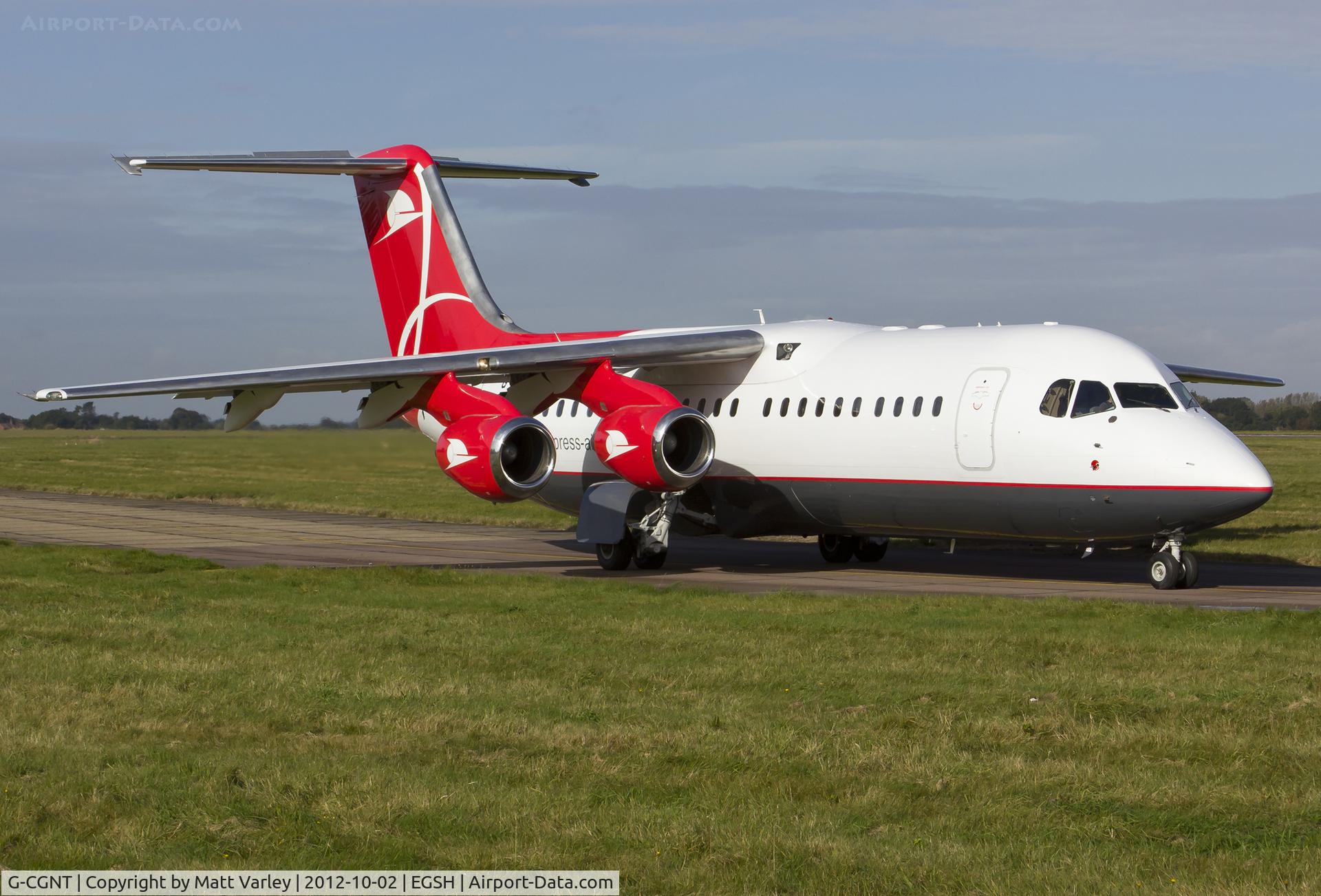 G-CGNT, 2000 Avro RJ100 C/N E.3374, Departing EGSH after spray into Asian Express C/S.