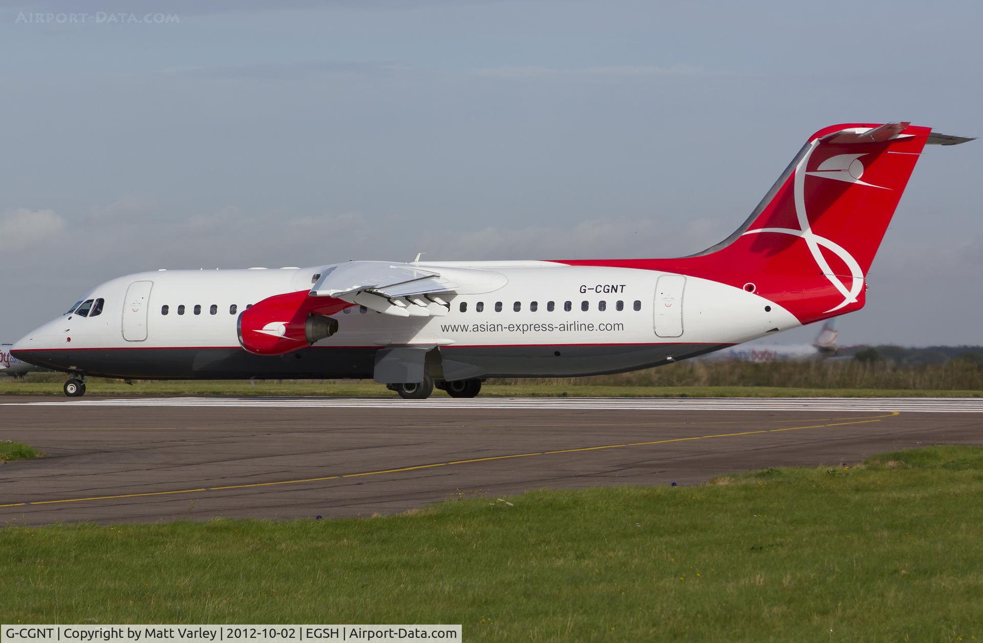 G-CGNT, 2000 Avro RJ100 C/N E.3374, Departing EGSH after spray into Asian Express C/S.