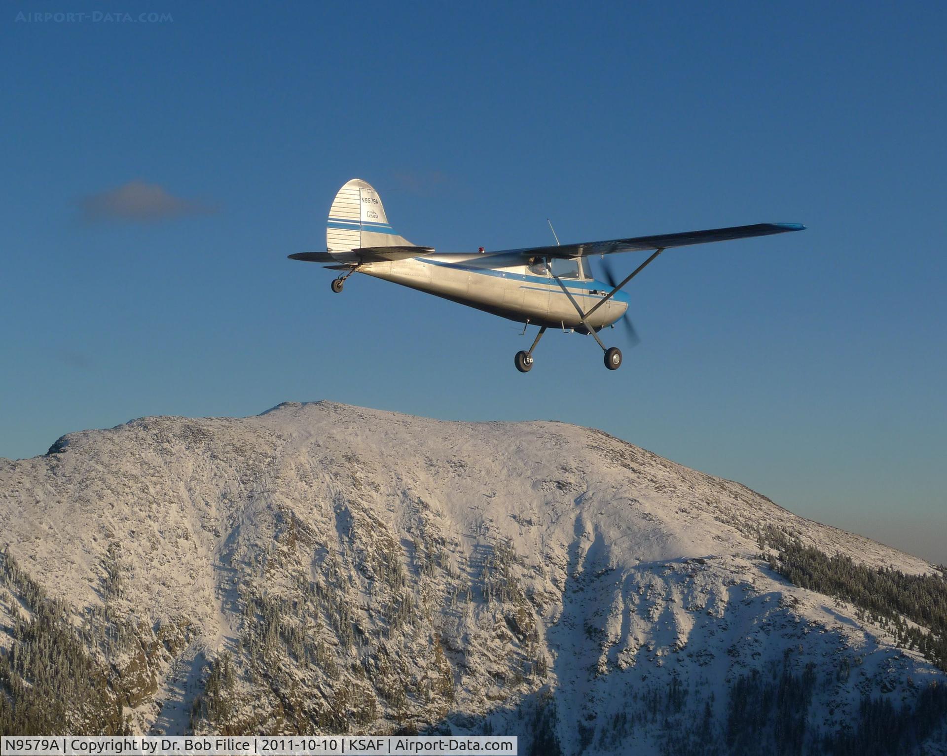N9579A, 1949 Cessna 170A C/N 19140, This 170 has the stock O-300 engine, but with a really aggressive climb prop, it does pretty well in the mountains if lightly loaded.  That's Santa Fe Baldy in the background, elevation 12,632 msl.