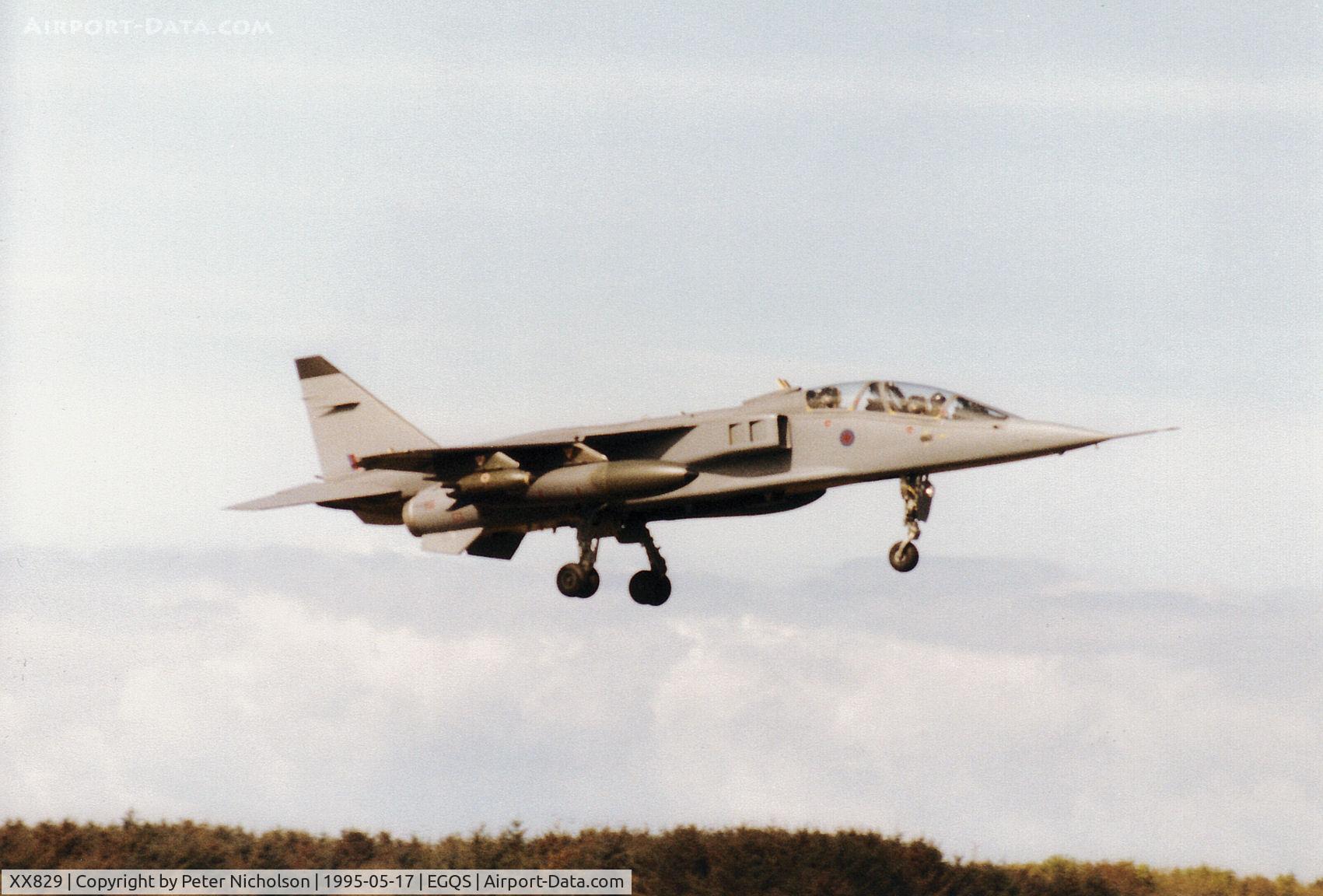 XX829, 1974 Sepecat Jaguar T.2A C/N B.17, Jaguar T.2A, callsign Wildcat 2, of 16[Reserve] Squadron on final approach to Runway 05 at RAF Lossiemouth in the Summer of 1995.