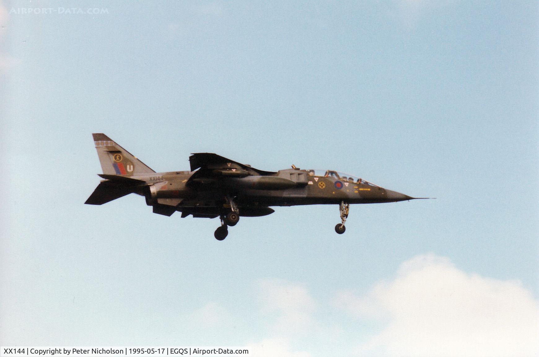 XX144, 1974 Sepecat Jaguar T.2A C/N B.9, Jaguar T.2A, callsign Wildcat 2, of 16[Reserve] Squadron landing on Runway 05 at RAF Lossiemouth in the Summer of 1995.