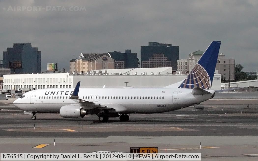 N76515, 2008 Boeing 737-824 C/N 31623, One of United's Boeing 737s glides past Newark's northern cargo terminal.