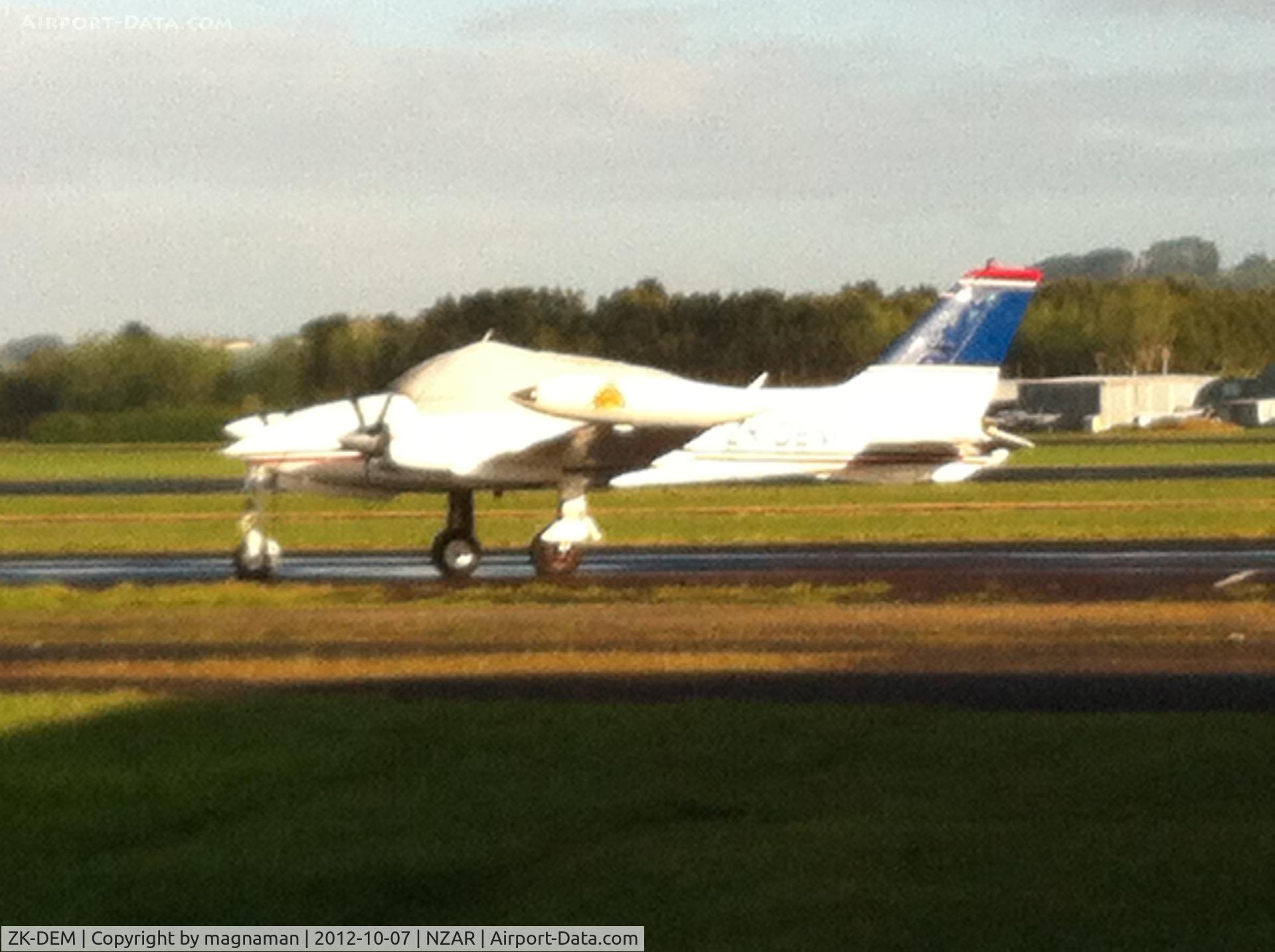 ZK-DEM, 1973 Cessna 310Q C/N 310Q0765, A bit too sunny - but had to take from behind fence.