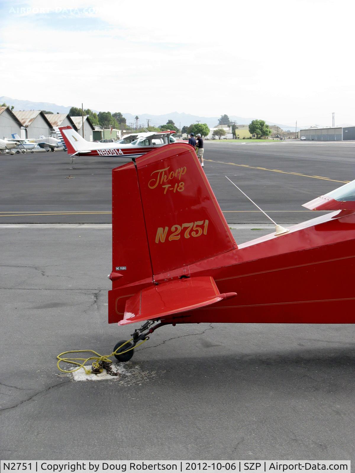 N2751, 1976 Thorp T-18 Tiger C/N 300, 1976 Stork THORP T-18 TIGER, Lycoming O&VO-360 180 Hp, tail logo.