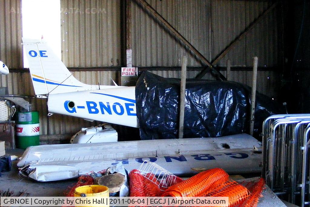 G-BNOE, 1987 Piper PA-28-161 Cherokee Warrior II C/N 2816013, damaged after an aborted take off from Walton Wood Airfield on 28 January 2011. The aircraft overran the end of the runway and came to rest in a shallow ditch in a field beyond.