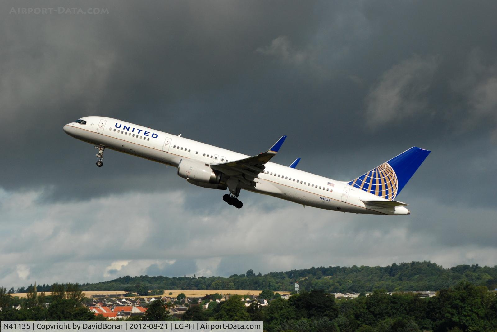 N41135, 1999 Boeing 757-224 C/N 29284, Departing Rwy 24 before a threatening Edinburgh sky, bound for New York