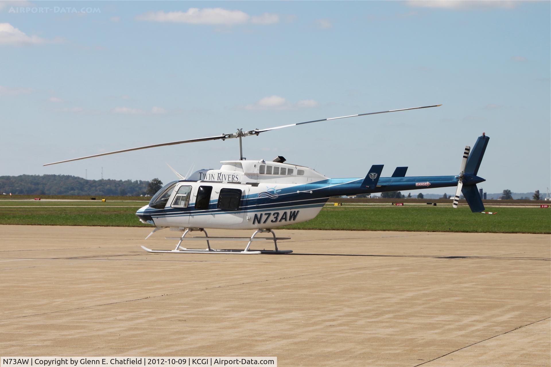 N73AW, 1995 Bell 206L-4 LongRanger IV LongRanger C/N 52115, Had to crawl behind bushes and shoot through the fence for this one!