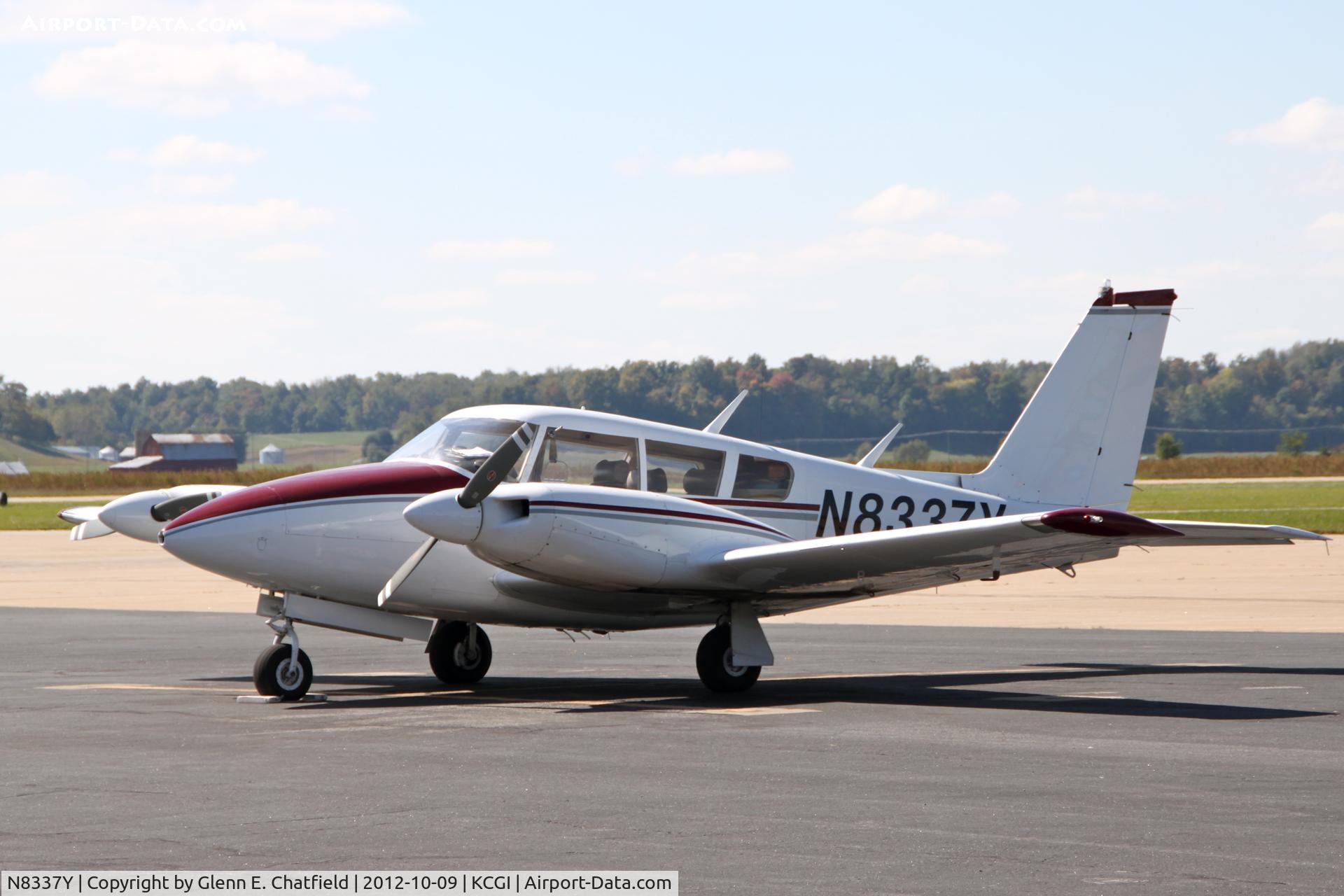 N8337Y, 1967 Piper PA-30 Twin Comanche C/N 30-1483, Had to shoot through the fence for this one!