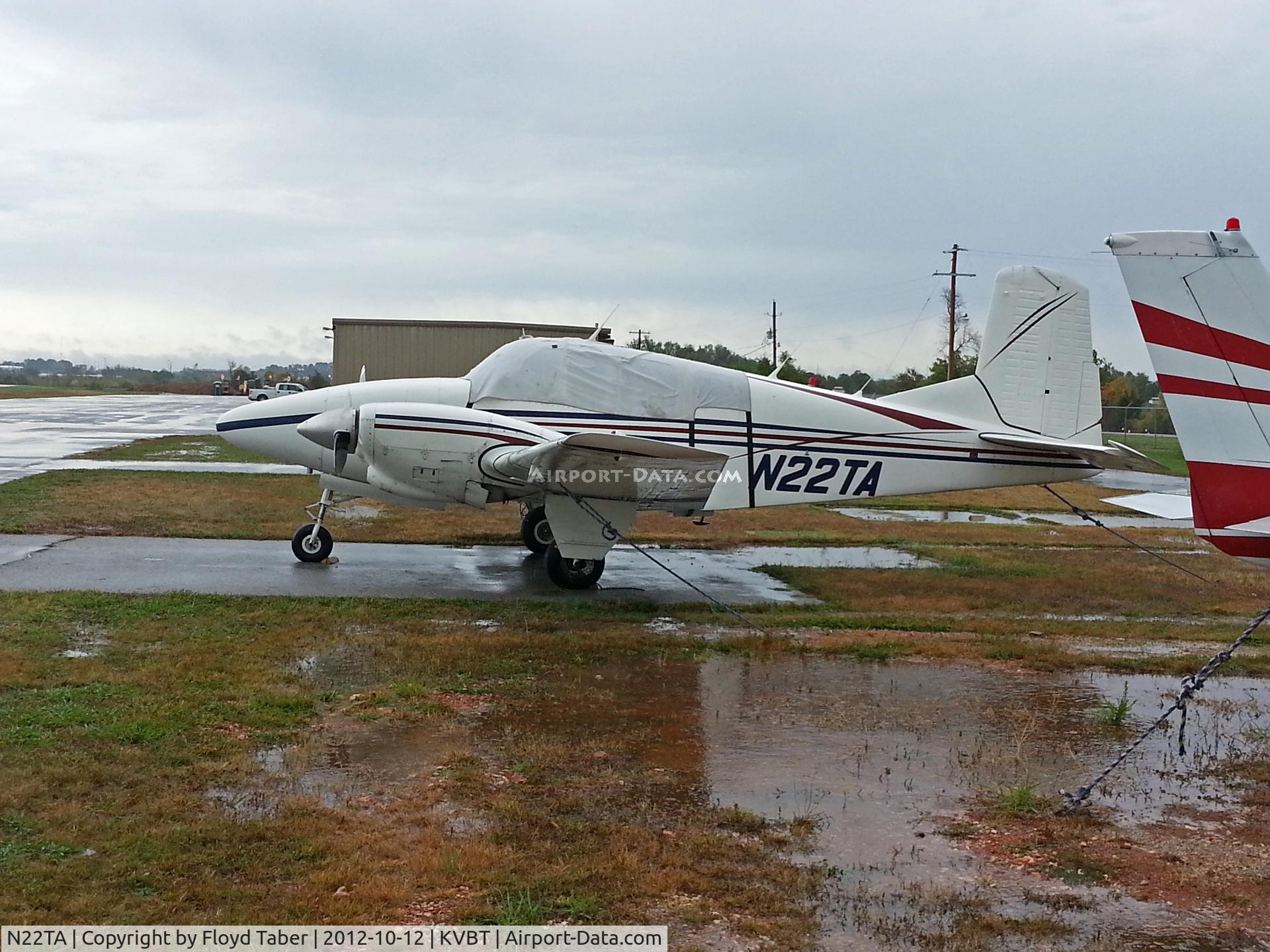 N22TA, 1959 Beech 95 Travel Air C/N TD-250, Tied down outside at Bentonville