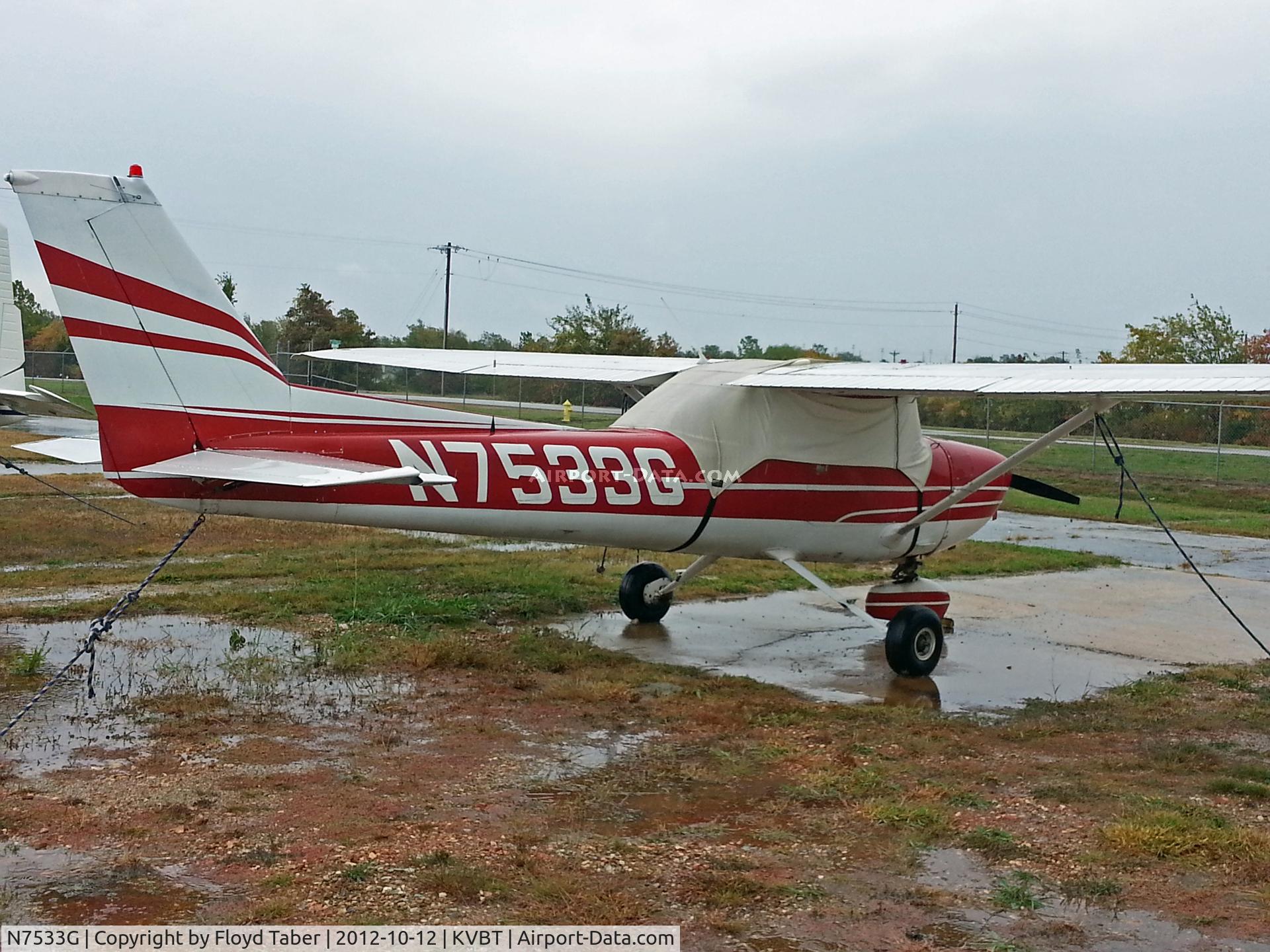 N7533G, 1973 Cessna 150L C/N 15074691, Sitting tied down outside all but forgotten Bentonville
